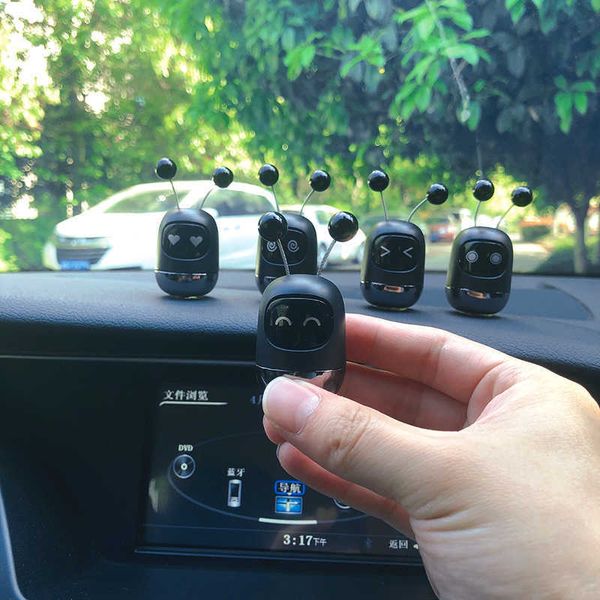 

interior decorations cute anime shaking robot car interior decoration ornament funny face robot auto center console decoration for car acces
