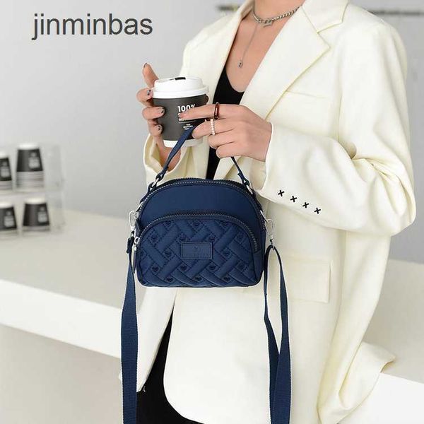 

2023 new hand bag factory 80% wholesale and retail women's oxford cloth leisure travel college student small backpack one shoulder msen