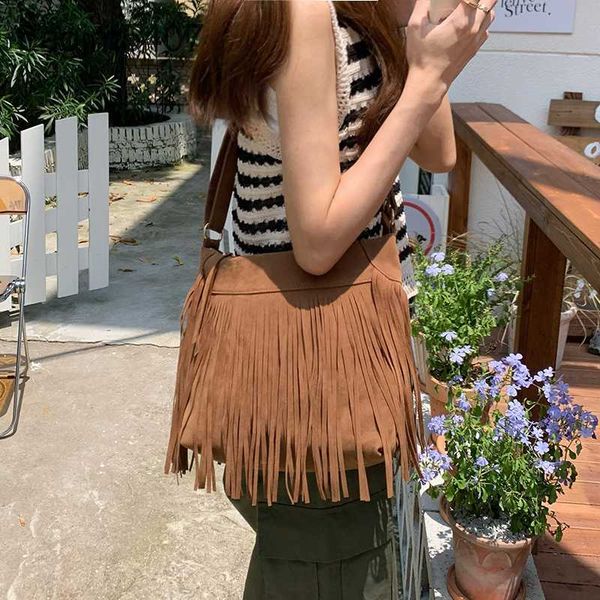 

2023 design bag stores 70% wholesale and retail american bohemian tassel new style suede saddle fashion spice girl one shoulder msenger