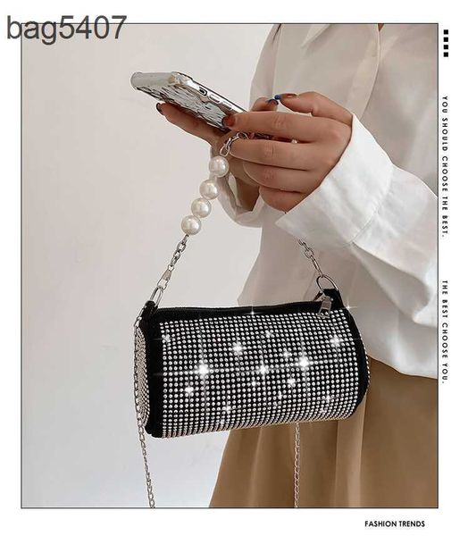 

2023 new drill bag 80% discount wholesale and retail fashion women ocean chain one shoulder oblique span pearl handheld cylinder