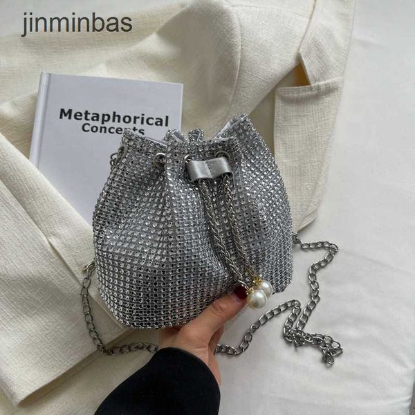 

2023 fashion diamond bag 60% discount wholesale retail new summer shiny hand inlaid rhintone foreign air bucket chain strap portable msenger
