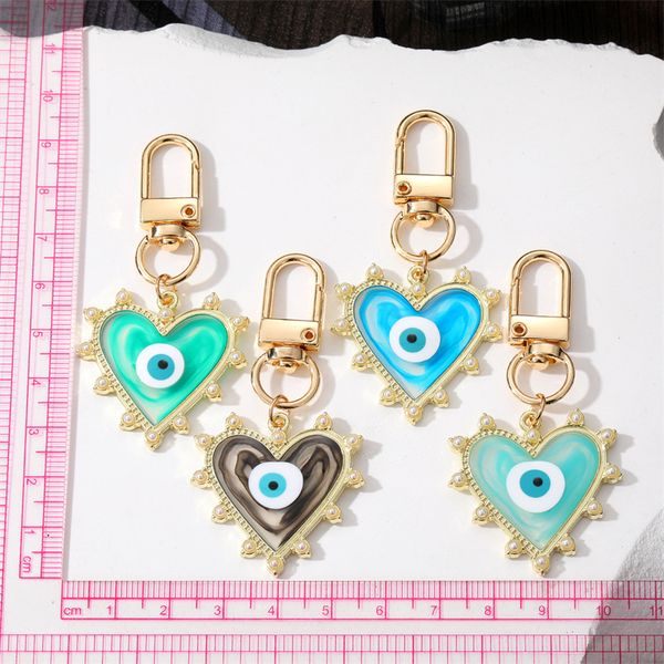 

candy color blooming heart evil eye clasp key rings for friend lovers gift resin eye bag car keyring pendant keychain, Slivery;golden