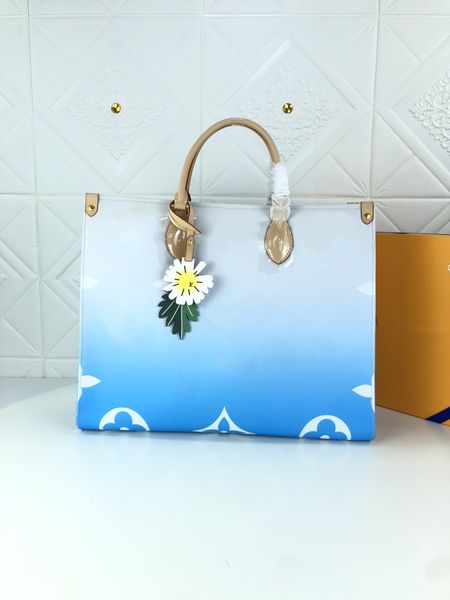 

sunrise pastel onthego mm totes bag colorful womens designer shoulder handbag purse on the go 2022 spring in the city collection pink coated