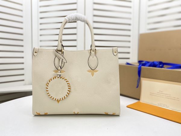 

pastel onthego mm yellow totes bag colorful womens designer shoulder handbag purse on the go 2022 spring in the city collection pink coated