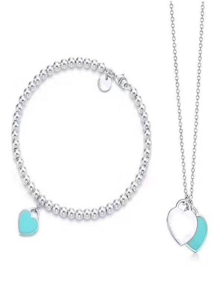 

2019 women silver thin beads blue silver heart plate stainless steel pendant necklaces and bracelet suit with box and4888714