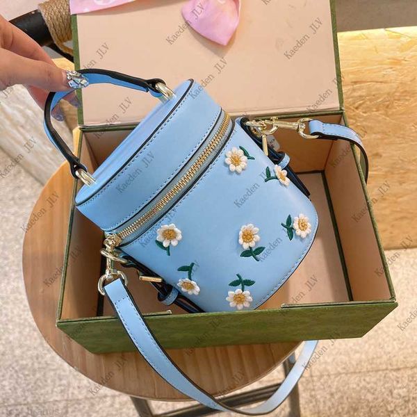 

luxury designer bucket bag fashion flower decoration leather one-shoulder diagonal bag top