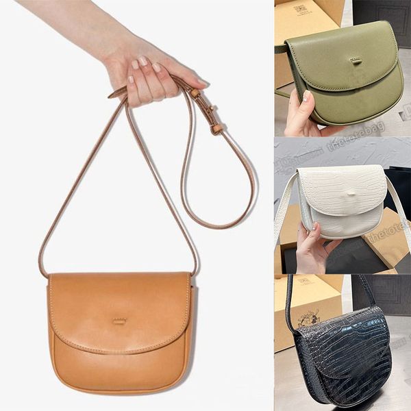 

kaia small satchel bag with flap featuring a metal knocker and adjustable shoulder strap classic lady luxury designer smooth leather solid c