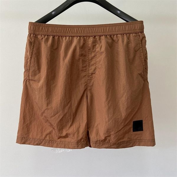 

casual nylon metal stone mens shorts relaxed multi color pocket drawstring nylon sport short pant for men, White;black