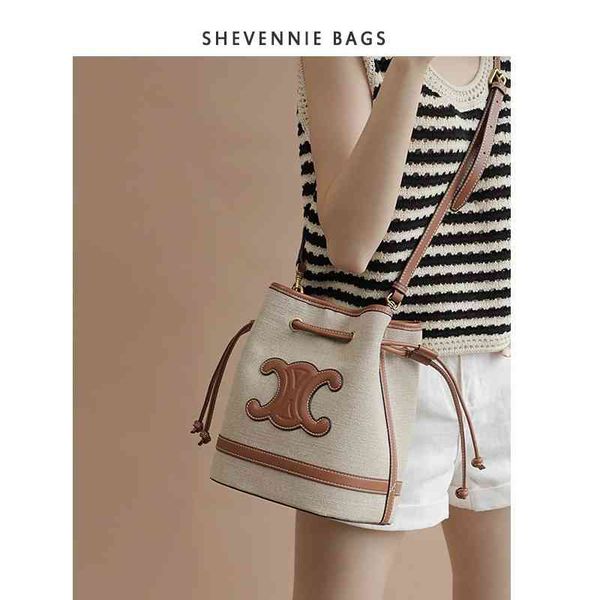 

2022xueyunni 2022 new canvas cowhide bucket bag messenger large capacity women's11