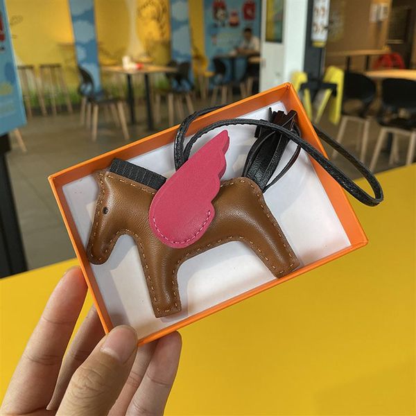 

brand swift sheepskin horse bag charm keychains luxury paddock keyring real leather nano pegasus pendant wing flying ornament211u, Silver