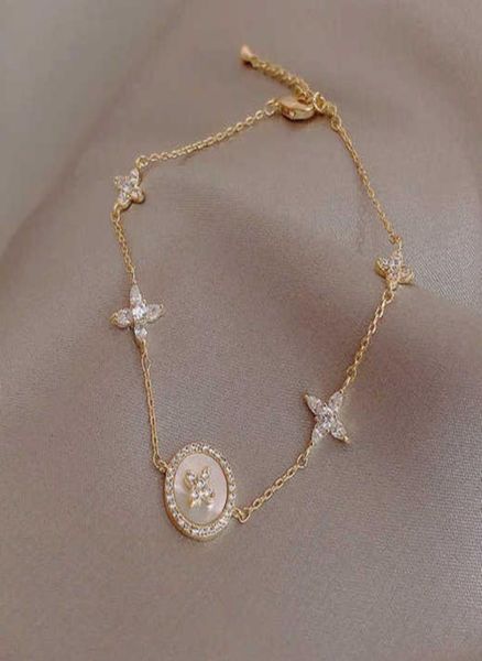 

classic fashion bracelet female mode micro zirkoon korean brand bracelets women039s jewelry alloy plum blossom cross shape chai8622621, Golden;silver