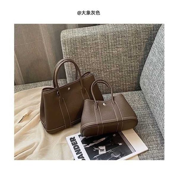 

aher max designer leather herme garden bag 2023 autumn and winter fashion leather handheld women commuter large capacity litchi pattern hard