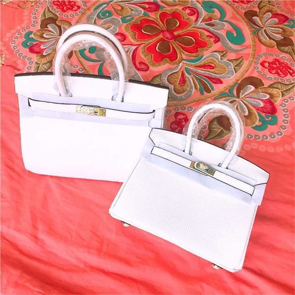 

design purse new head layer leather contrast bag color matching white powder litchi grain women's bag fashion