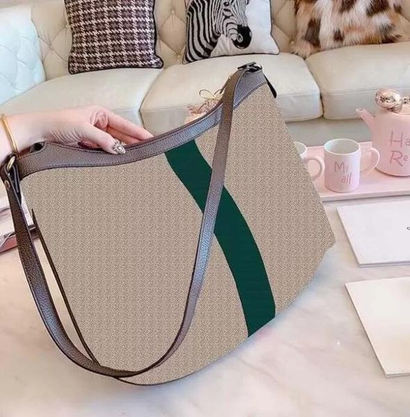 

luxury designer ladies brown crescent shaped messenger bag women's leather luxury handbag designer small ladies large capacity 33cm sho