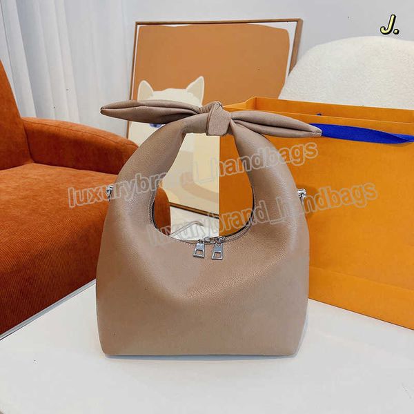 

designer bag pm handle beige bag perforated shoulder cream knot-shape womens designer knot mahina leather bags braided chain luxury cross bo