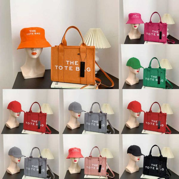 

the tote bag womens fall and winter designer handbag 2022 imitation deer fur shoulder crossbody messager bags, Red;black