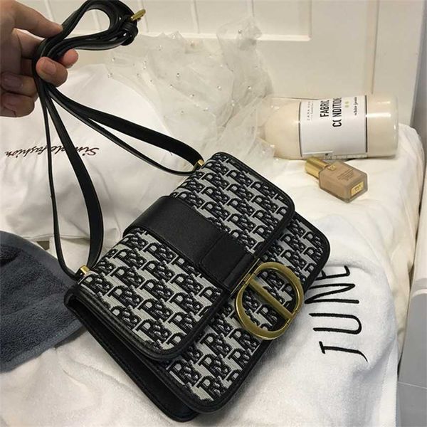 

women's saddle new fashion versatile sense messenger bag purses sale