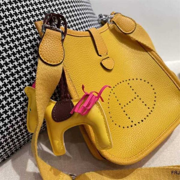 

herme evelyn designer womens bags bucket single shoulder oblique span bag head leather 221 new hollow vers
