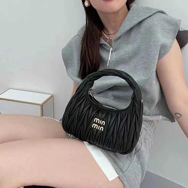 

shoulder bags designer fashion mm handbags wrist small crowd design 2022 new same pleated hand-held one underarm stick cross body f75x young