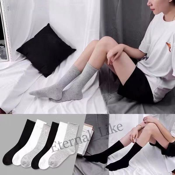 

autumn and winter long tube high waist socks cotton breathable men's black-and-white socks tide street shooting solid color towel botto
