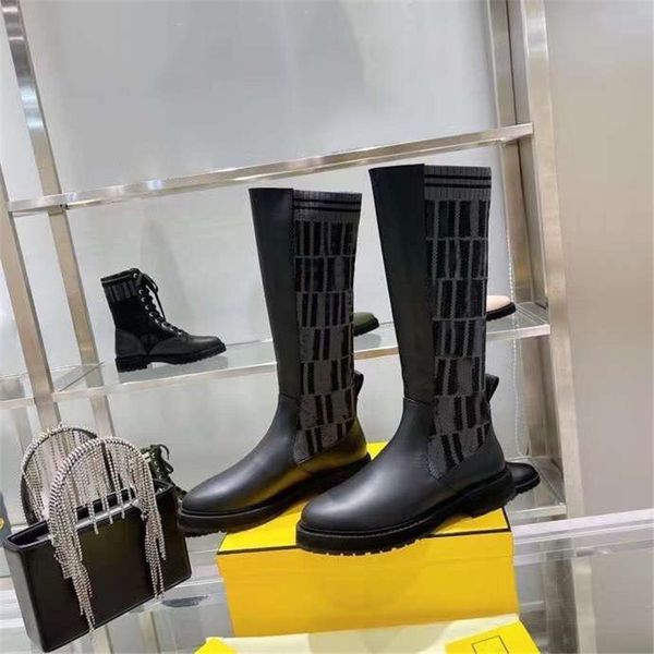 

designer luxury rockoko black leather boots with elastic fabric booties with original box