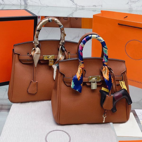 

large capacity shoulder bag handbags women shopping tote bags genuien leather clemence metal hardware twist buckle lock ribbons decorate rem