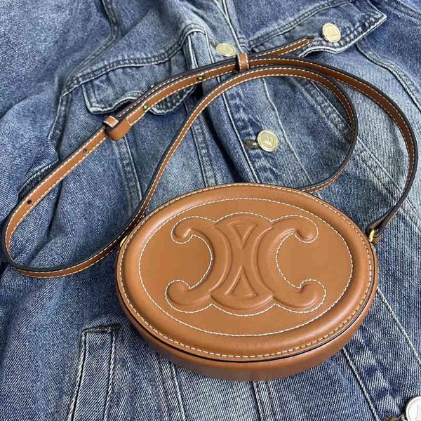 

2022 new triumph arch small round bag cowhide pig nose fashion mini one shoulder crossbody moon cake