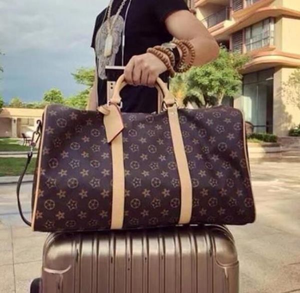

2022 duffel bags luxury fashion men women travel duffle bags brand designer luggage handbags with lock large capacity sport bag size 54cm