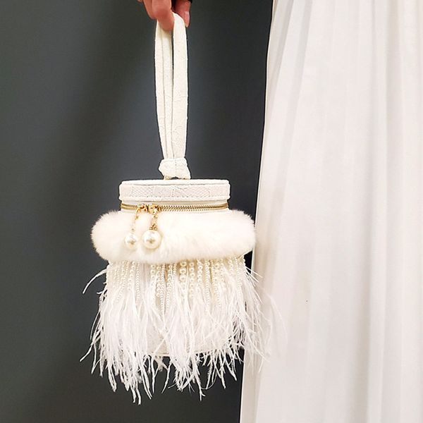 

waist bags ostrich fur bucket pearl crossbody fashion shoulder chain women purses handbags luxury designer tassel 221119
