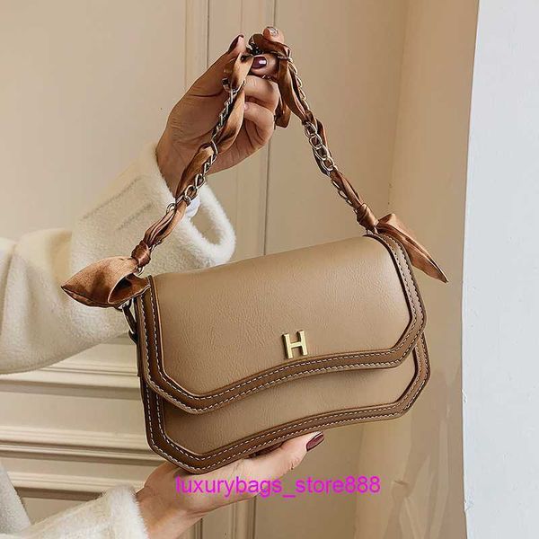 

brand women 2023 new crowd light luxury small square commuter shoulder armpit design bag retail wholesale