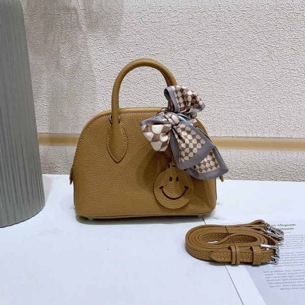

sell designer bags on the 2023 new h19cm shell wrap layer cowhide togo soft leather mini bowling handheld women's bag crossbody