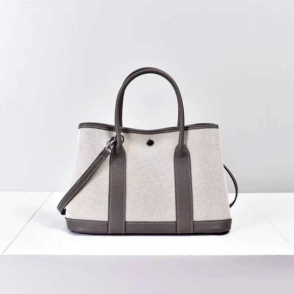 

sell designer bags on the h2023 new layer cow leather with linen canvas garden tote portable cross body female