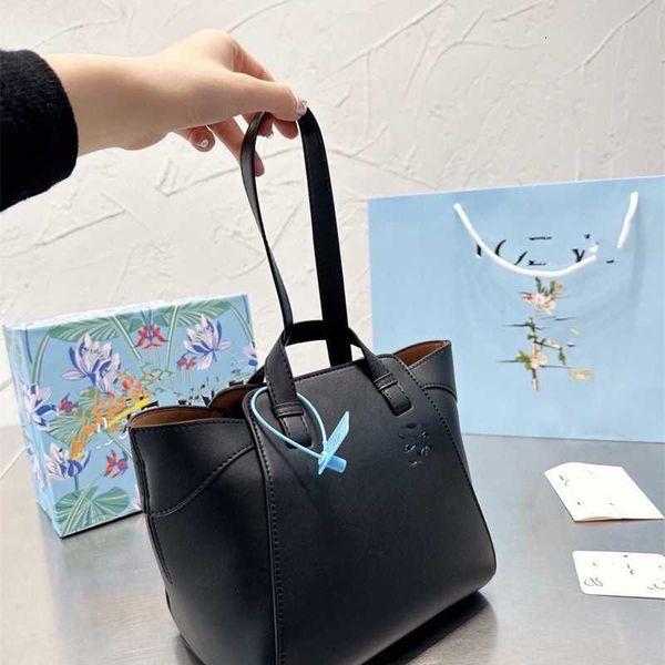 

loewee's new tote women's bag has soft fabrics with multiple back methods