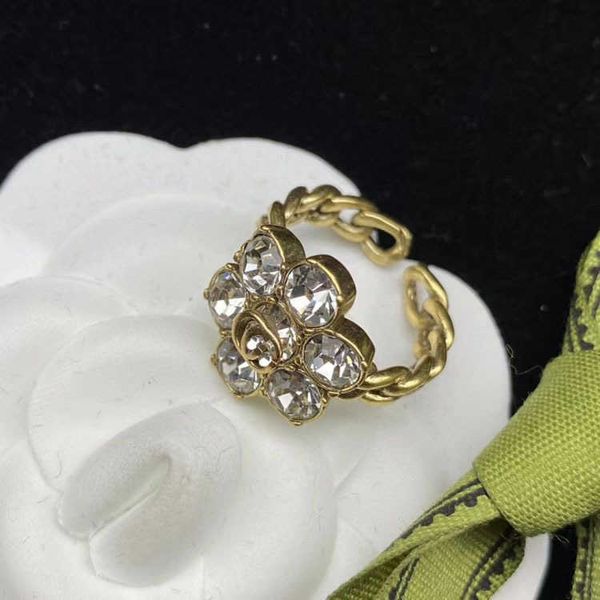 

2023 designer new jewelry double stone inlaid twisted sheet adjustable open brass popular fashion ring, Silver