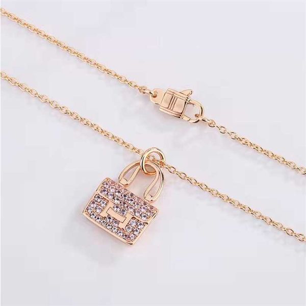 

2023 jewelry family kangkang female set with lettered clavicle chain bag pendant versatile necklace silver chain