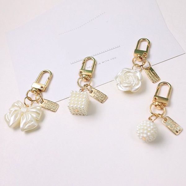 

rose flower keychain light luxury decorative versatile bow key chain pearl tassel keychain bag pendant, Silver