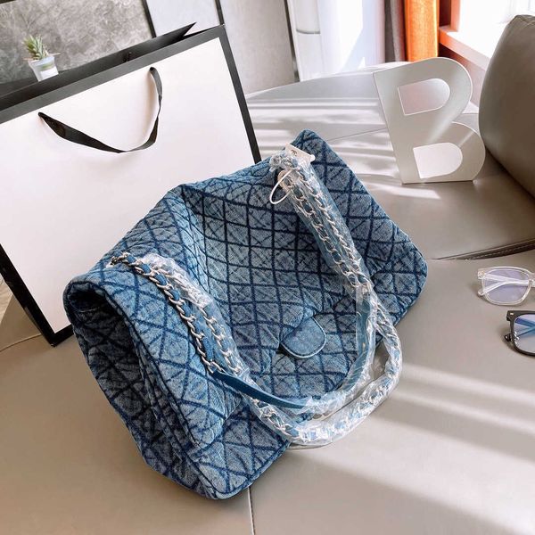 

stuff sacks xiaoxiangfeng middle ancient tannin cowboy female 2021 new washing old one shoulder bag shopping messenger bag