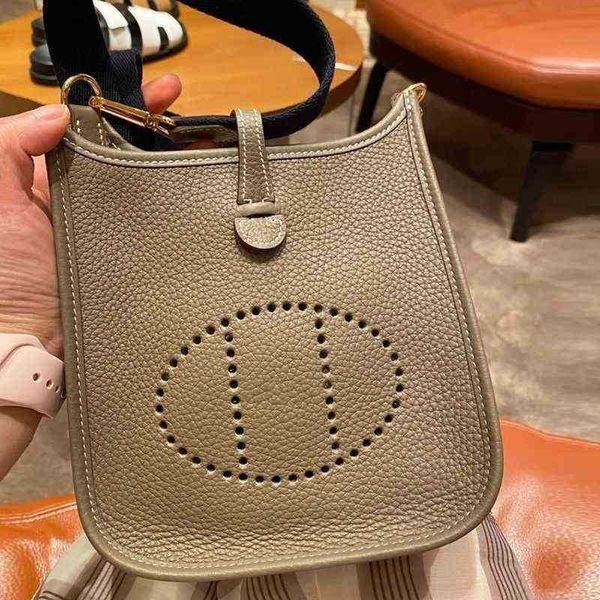 

designer handbags evelynes leather bags 2022 hollow out bucket layer cowhide litchi pattern women's single shoulder messenger mobile