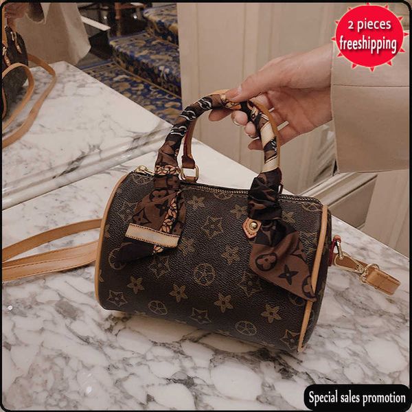 

factory direct sales 50% off designer bags mini hand bag boston pillow bag simple hand print women's msenger