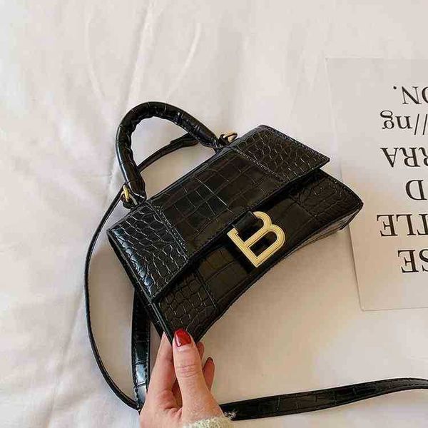 

balencaigabags light womens bags messenger retro crocodile hand high sense niche hourglass 2qhk