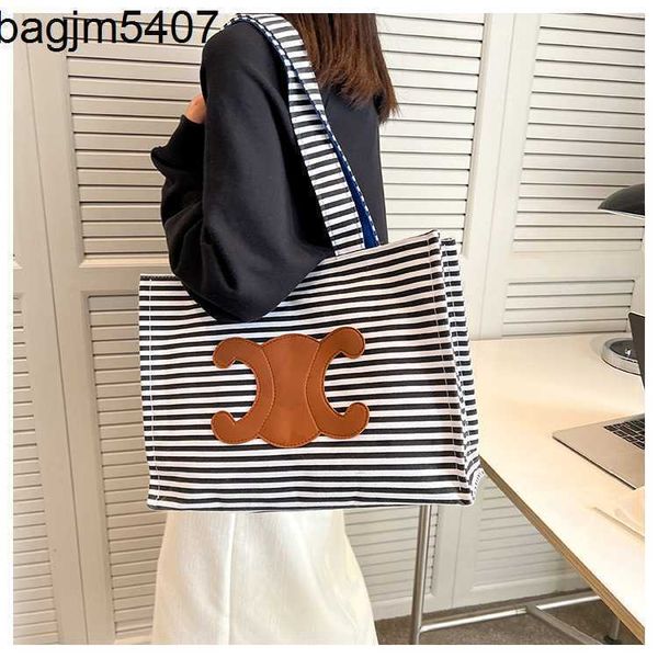 

design bag shop 80% factory wholesale and retail 2023 new fashion summer arc de triomphe armpit zebra stripe large capacity tote bag commute