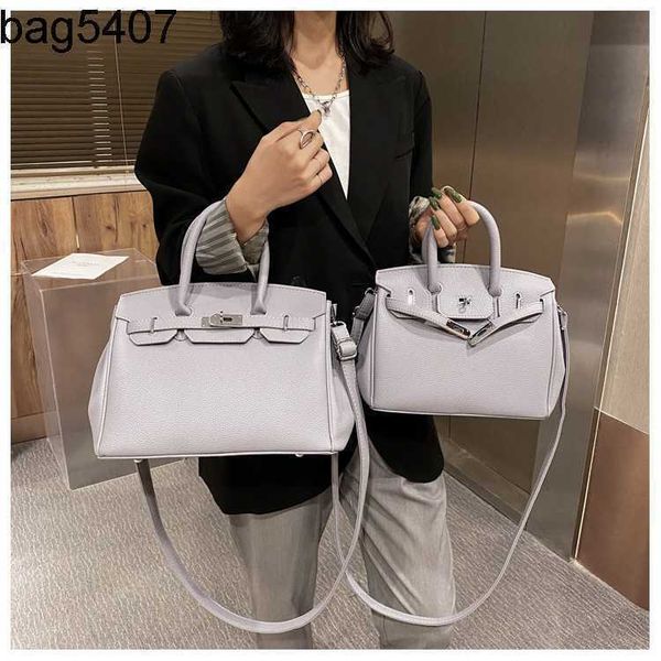 

design bag shop 80% wholesale and retail advanced sense big women's 2023 new fashion versatile buckle hand net red foreign style one sh