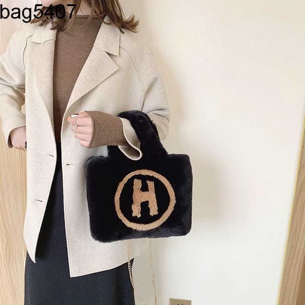

design bag shop 80% wholesale and retail new style rabbit hair imitation hand h word artificial wool female baby portable msenger casual fas