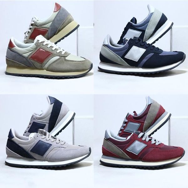 

gray-red 730 red running shoes shoe body is covered with leather navy blue palm velvet leather toe grip sole