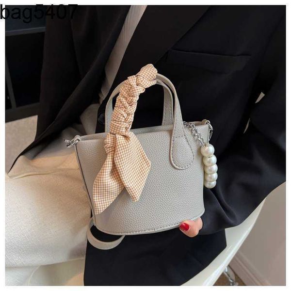

design bag shop 80% wholesale and retail premium women's korean version one shoulder msenger fashion women's 2023 new pearl qualit