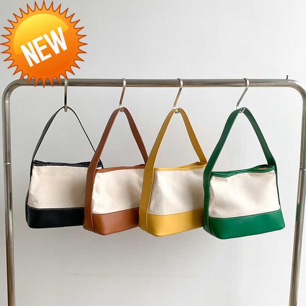 

luxury designer bags arc de triomphe armpit niche design single shoulder women's high sense splicing hand fashion canvas factory direct