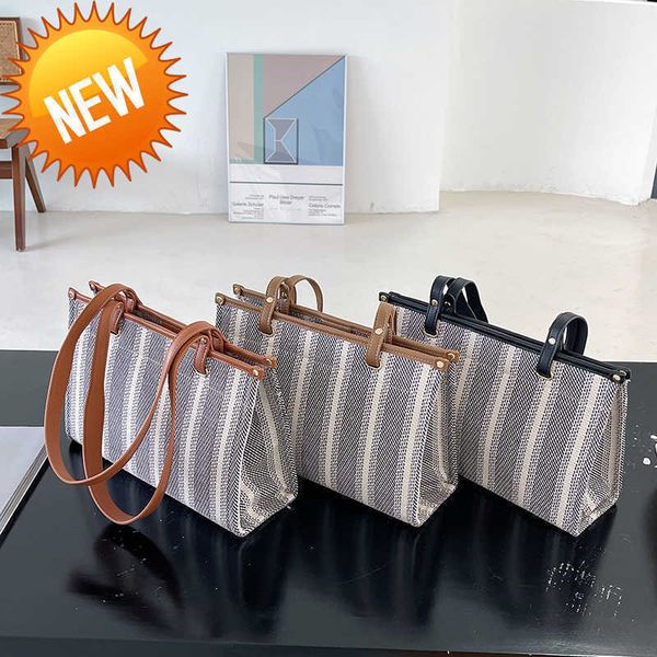 

luxury designer bags triumphal arch bag women 2023 new canvas tote high capacity korean stripe fashion small shoulder factory direct sales