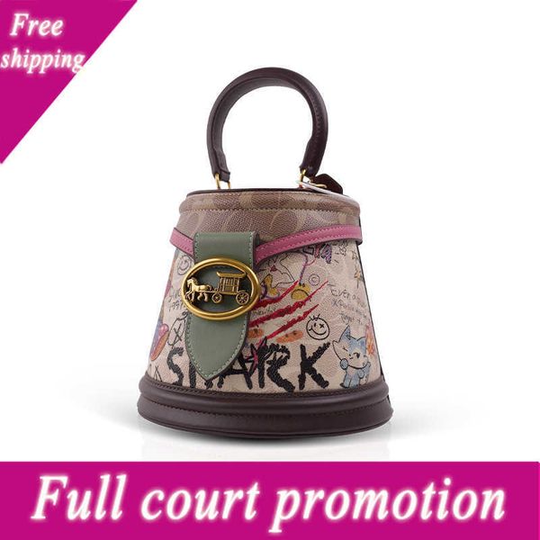 

luxury designer bags hong kong it 2022 summer new fashion bear graffiti bucket half single shoulder portable diagonal bag