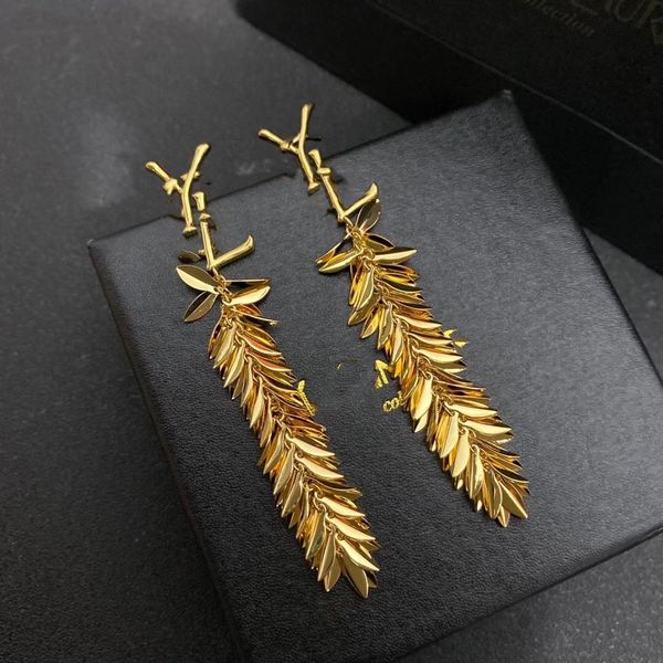

dangle & chandelier's tasseled look is perfect for allergenic earrings, Silver