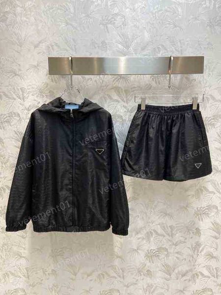 

womens two piece pants p..da classic nylon fabric dark print hooded trench coat and shorts two piece women designer tracksuits, White